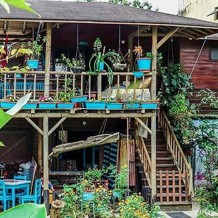 Wood House Hostel La Fortuna Bagian luar foto