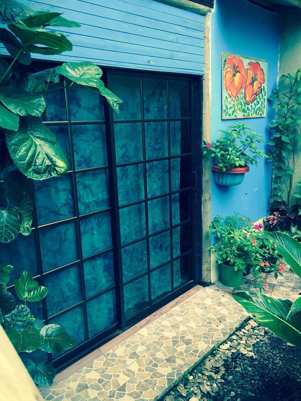 Wood House Hostel La Fortuna Bagian luar foto